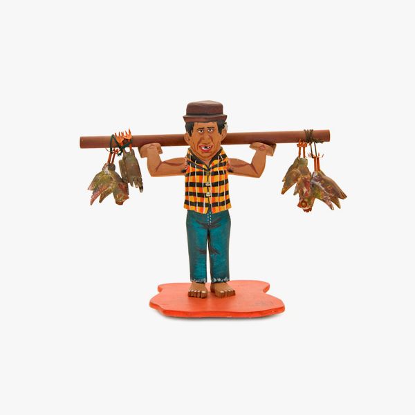 escultura_vendedor_galinha